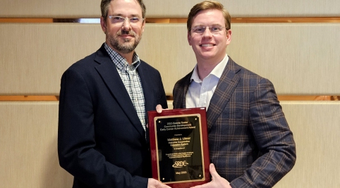 image of Dr. John Green and Matt Ulmer holding the 2023 bonnie teater award