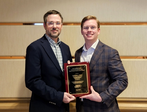 image of Dr. John Green and Matt Ulmer holding the 2023 bonnie teater award